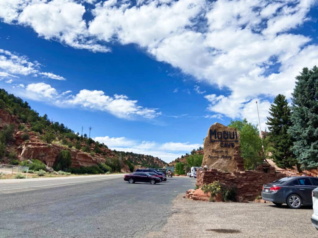 View of the parked vehicles at the entrance of Moqui Cave