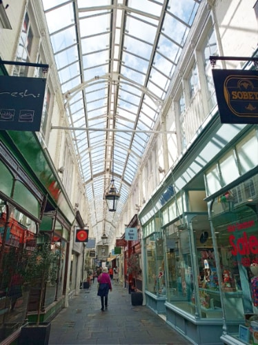 View of the shops and glass ceiling inside the Morgan Arcade