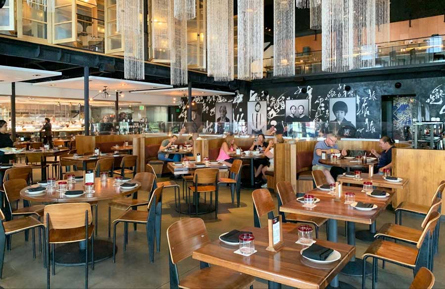 People enjoying their food in Morimoto ASIA