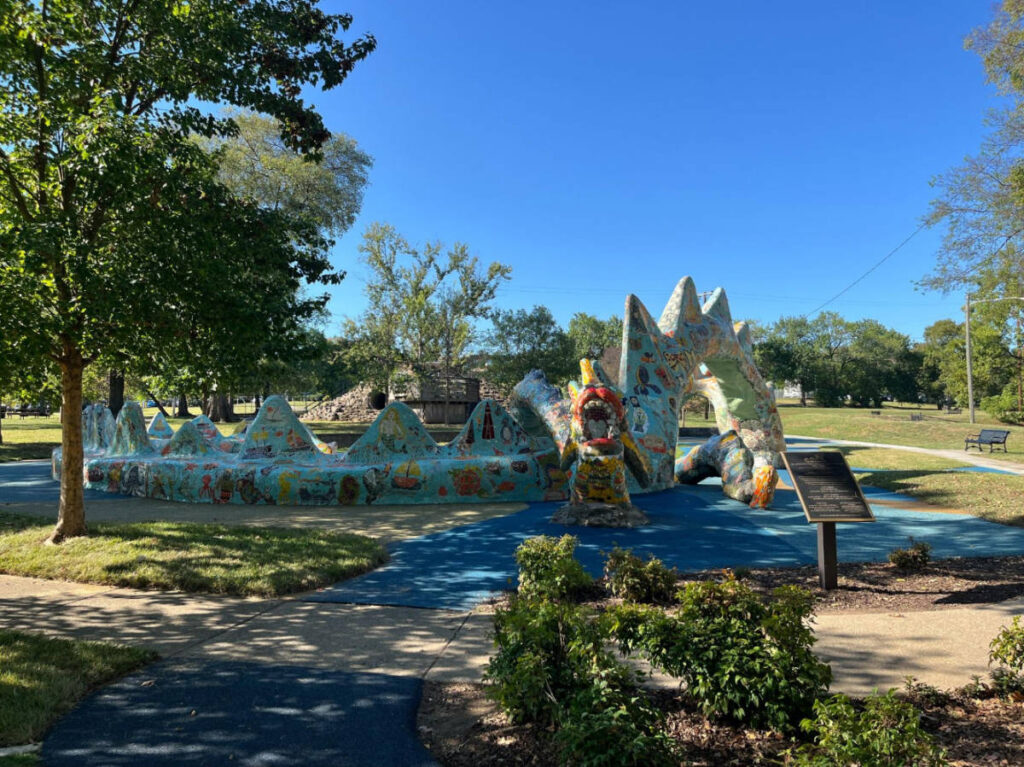 Clear blue sky over the mosaic dragon at the Fannie Mae Dee’s Park