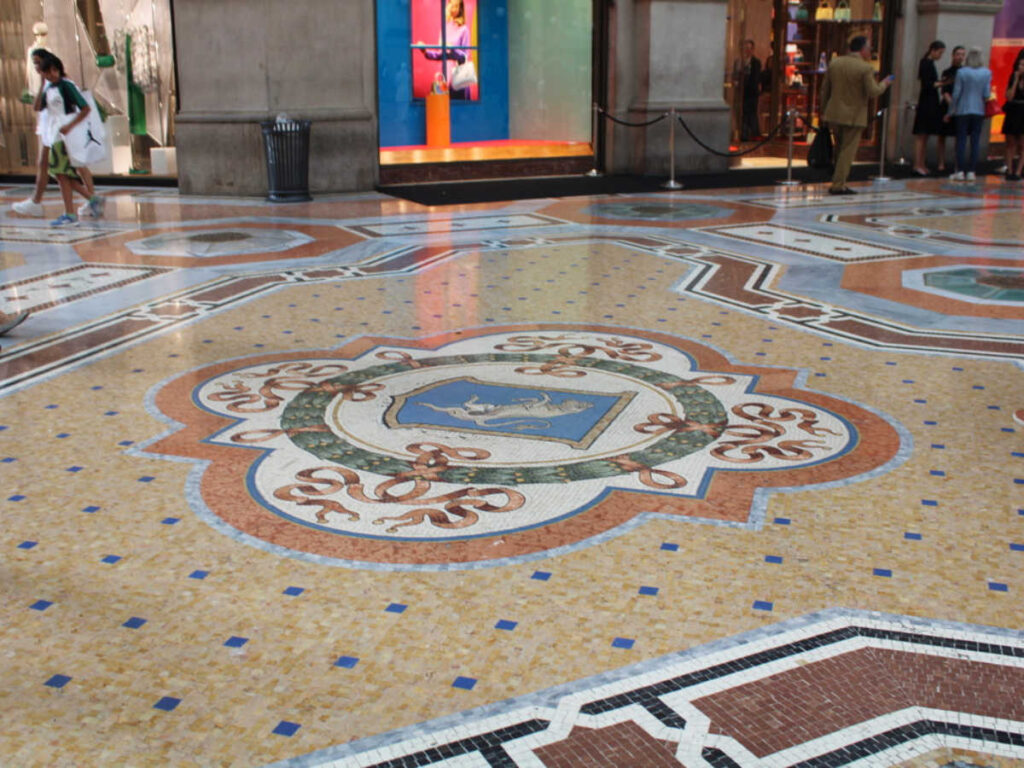 Close up look of the of the mosaic Turin Bull at Galleria Vittorio Emanuele II
