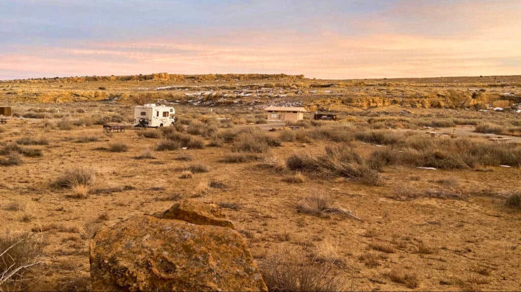 Panoramic view of the lone motorhome in the middle of the campground in Chaco Canyon