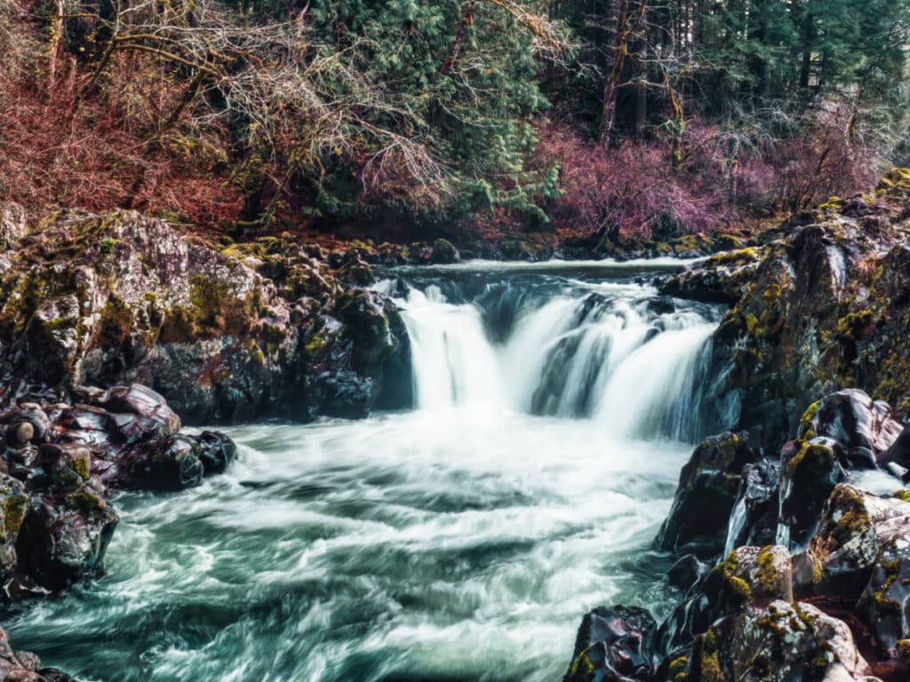 View of the small waterfall surrounded with huge rocks in Moulton Falls Regional Park