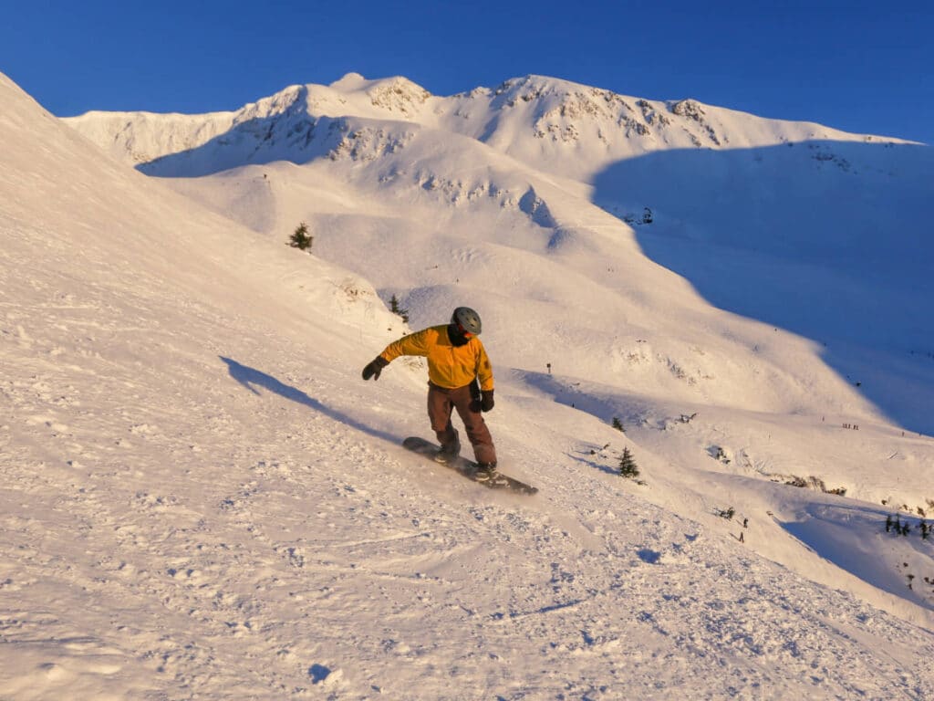A snowboarder enjoying his day at the Mount Alyeska