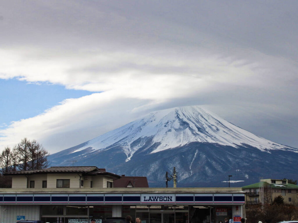 Majestic views of Mount Fuji behind the Lawson store