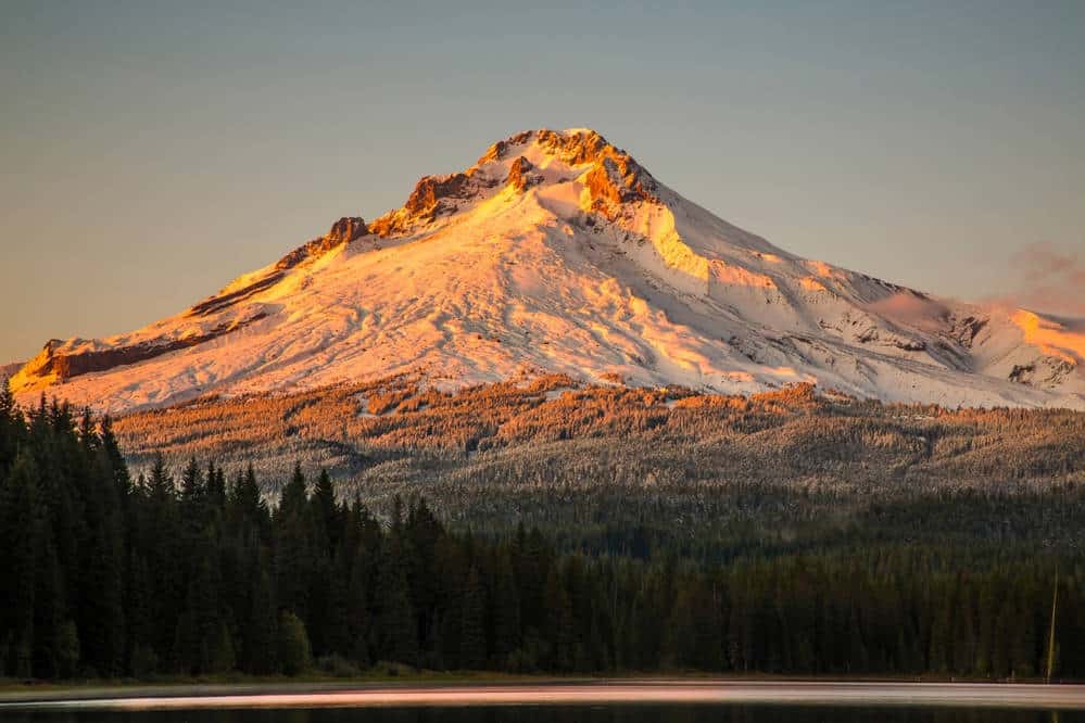 Mount Hood covered with snow during sunset