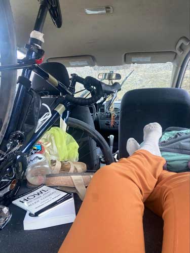 The author with her crammed-in bike inside her car