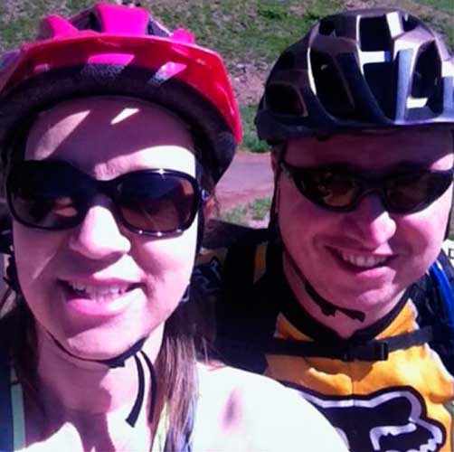 The author with her husband wearing their gears for mountain biking