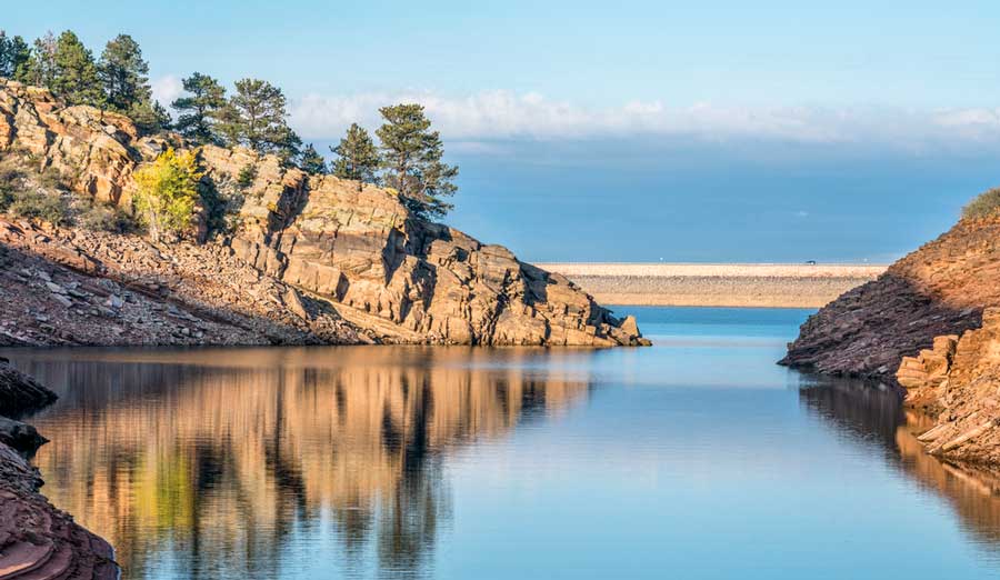 View of the Mountain Lake Horsetooth Reservoir and the clear blue sky over it