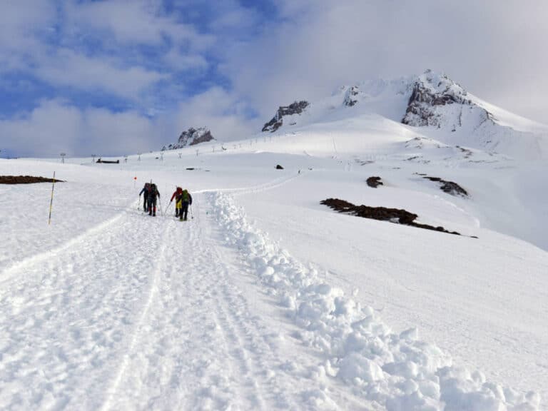 Mountaineers climbing Mount Hood during winter season