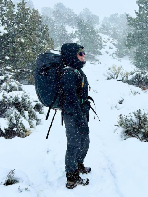 Skycie wearing a Mountainsmith Apex while smiling