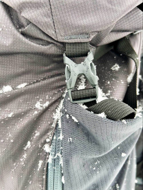 Close up view of a buckle in Mountainsmith Apex backpack