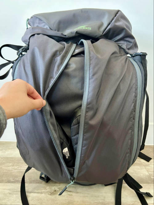 Close up view of the zippered front pocket of Mountainsmith Apex