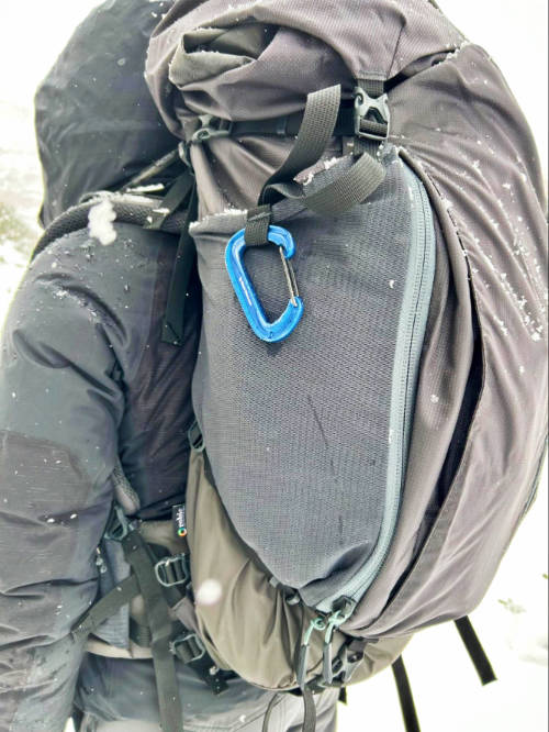 Close up view of the Mountainsmith Apex side deep mesh pocket