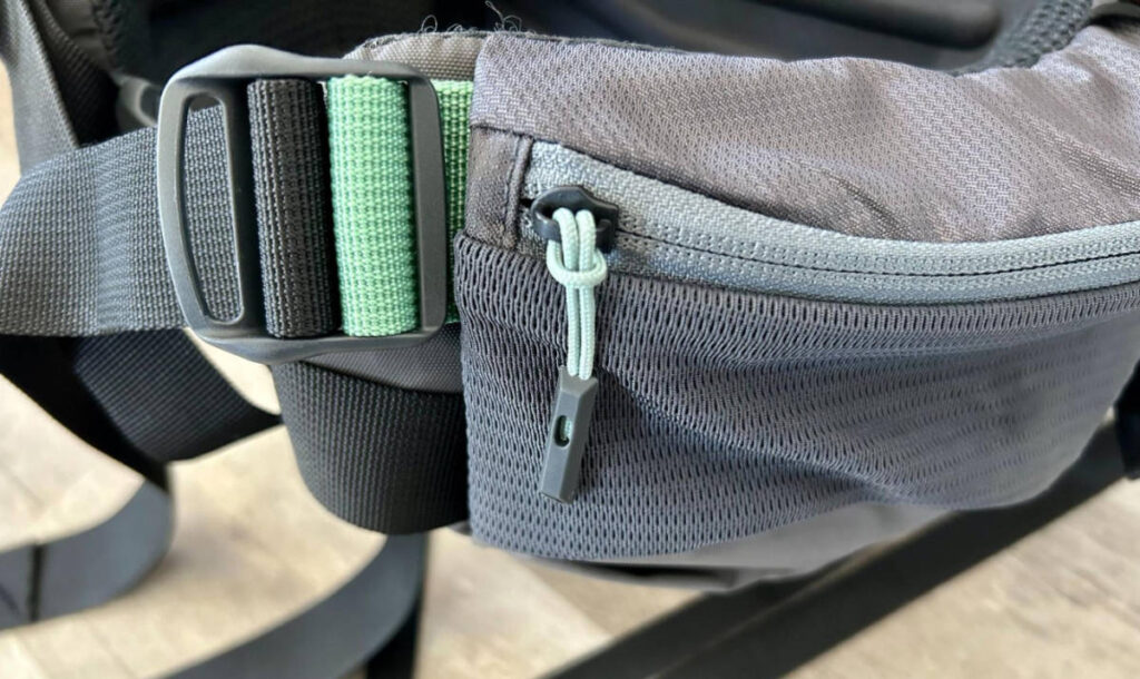 Close up view of the mesh waist belt pocket of Mountainsmith Apex