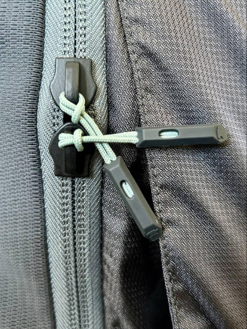Close up view of the zippers on the Mountainsmith Apex backpack