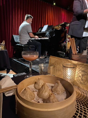Dumplings and cocktail served at Mr. Tipple’s Jazz Club