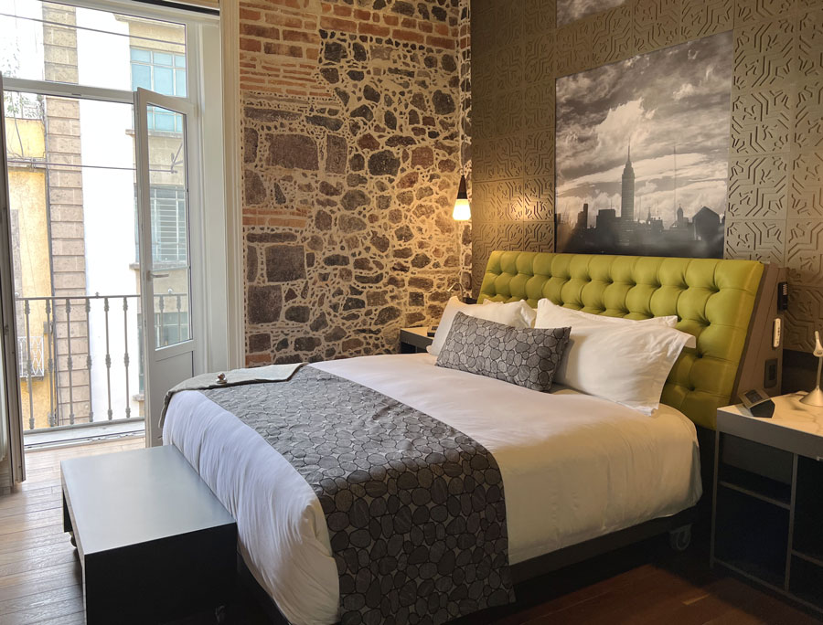 View of bed inside the Mumedi Hotel