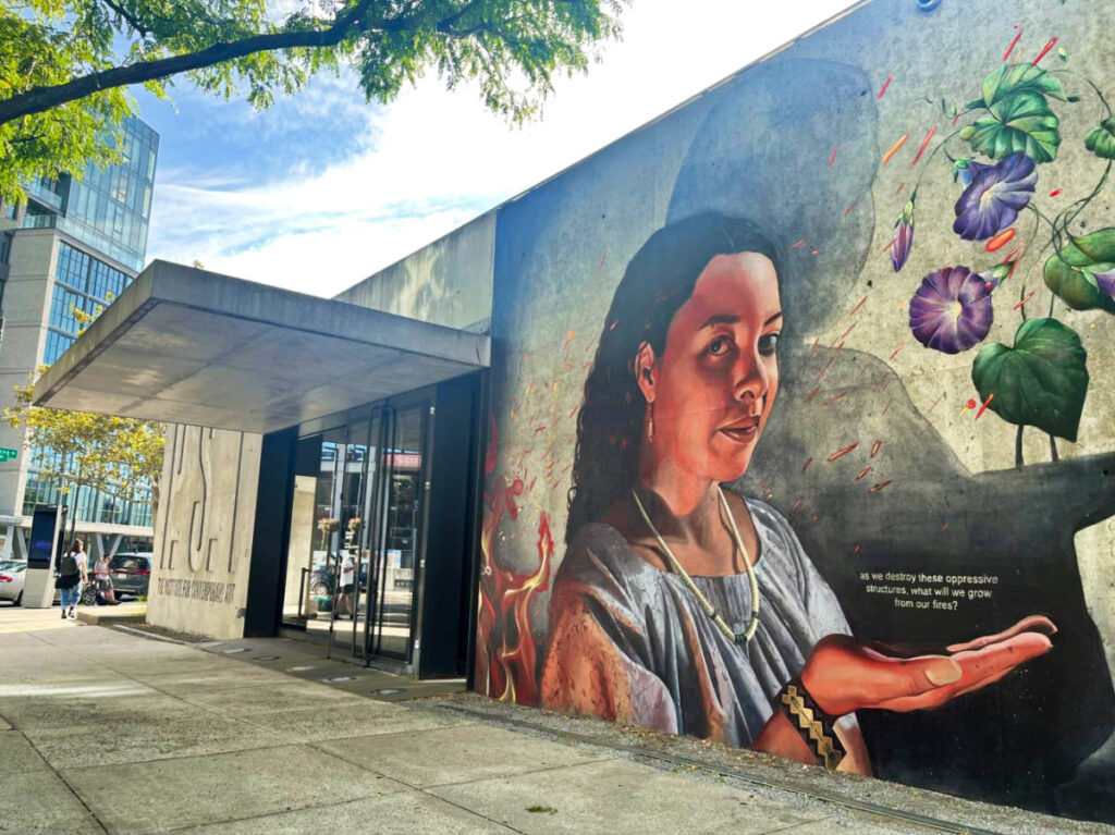 A huge mural outside and near the entrance of MoMA PS1