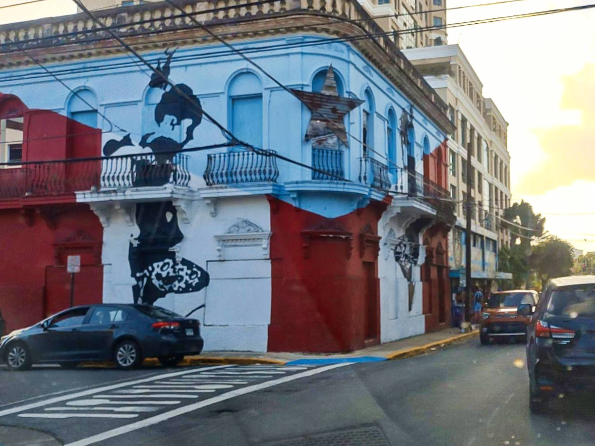 View of the mural around a building at Calle Loíza