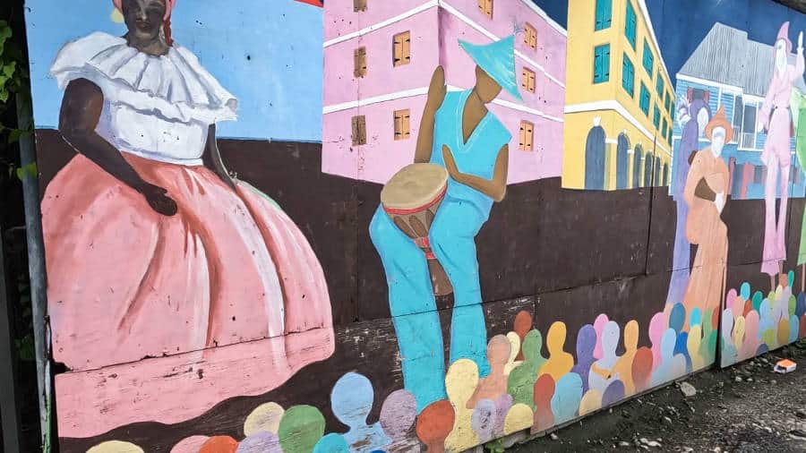A colorful mural about the people of the Virgin Islands in Frederiksted, St. Croix