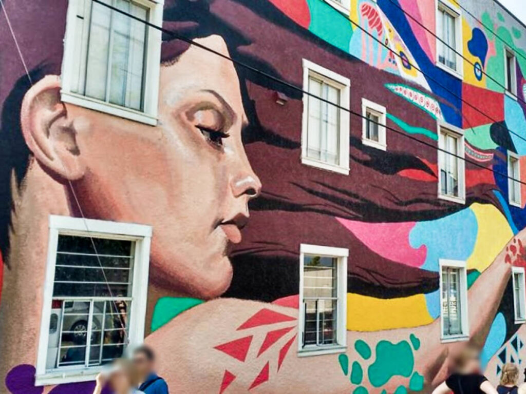 View of the stunning colorful mural on Mount Pleasant for the Mural Festival