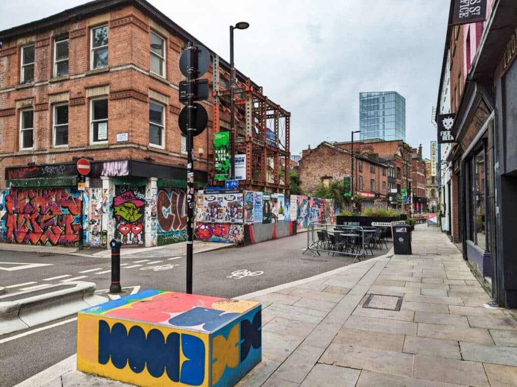 View of the murals and colorful street of Northern Quarter