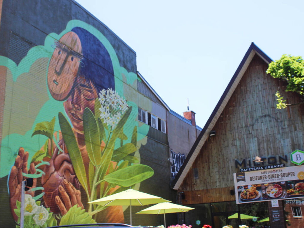 A colorful mural outside a restaurant