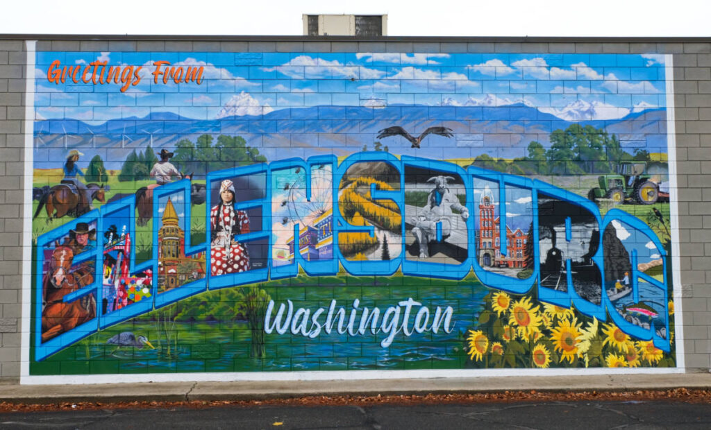 A colorful mural with the highlights of Ellensburg and the surrounding area