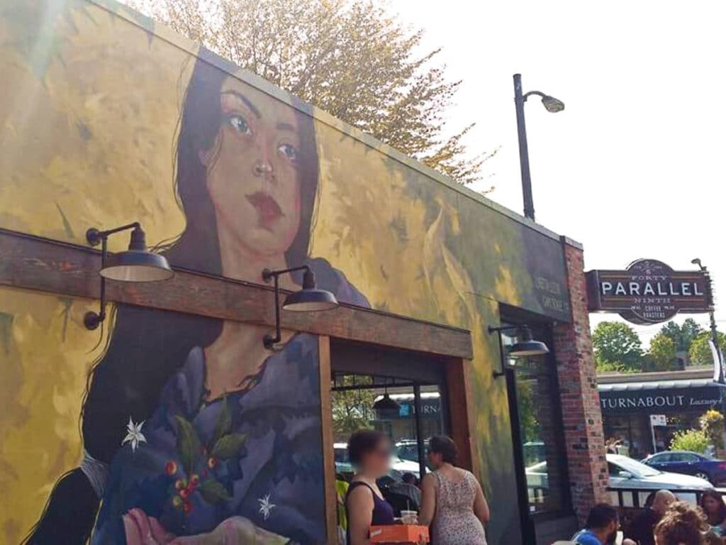 A mural of a woman on the exterior of a building in Mount Pleasant