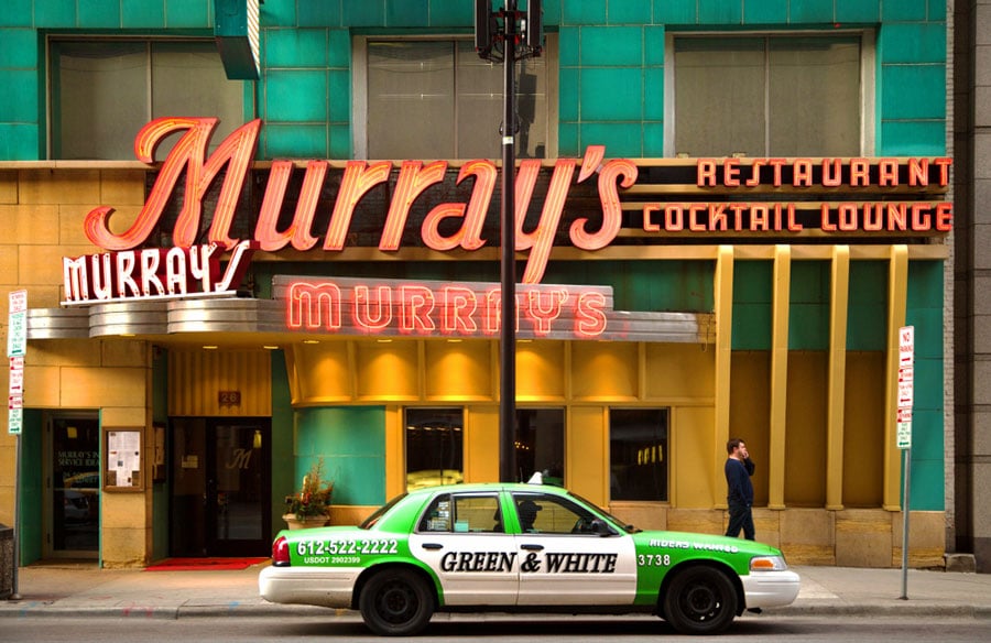 A taxi passing along the Murray's in Minneapolis