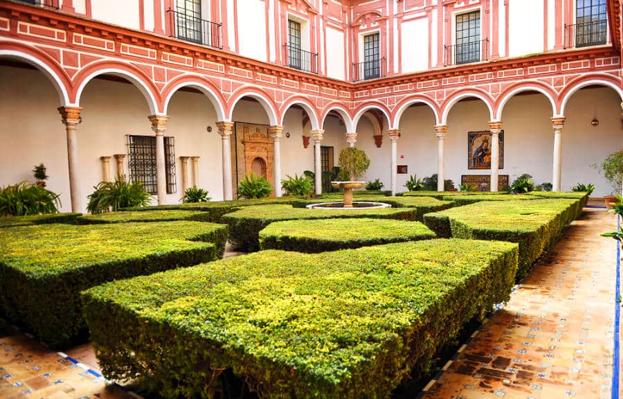 View of the boxwood courtyard inside the Museo de Bellas Artes in Seville