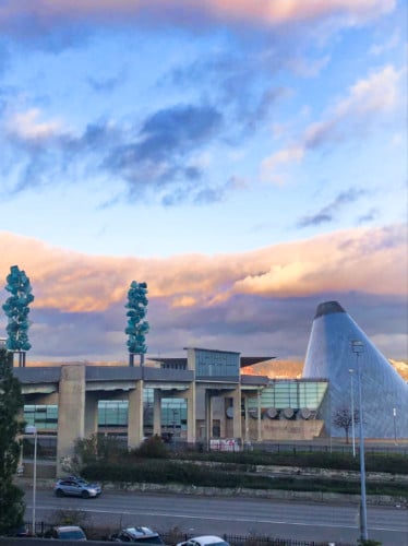 Exterior view of the Museum of Glass at sunset