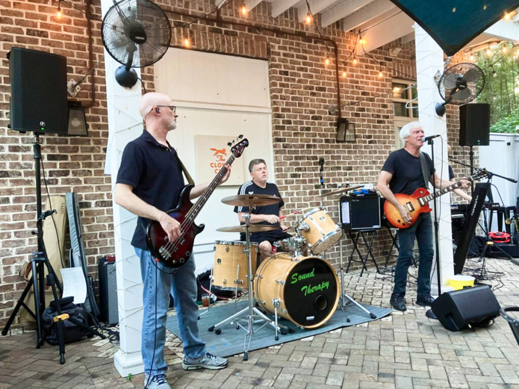 A band playing outside a restaurant in Bluffton