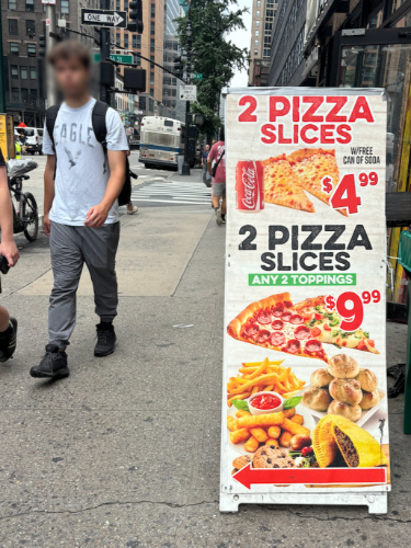 A signage of the New York Pizza deal
