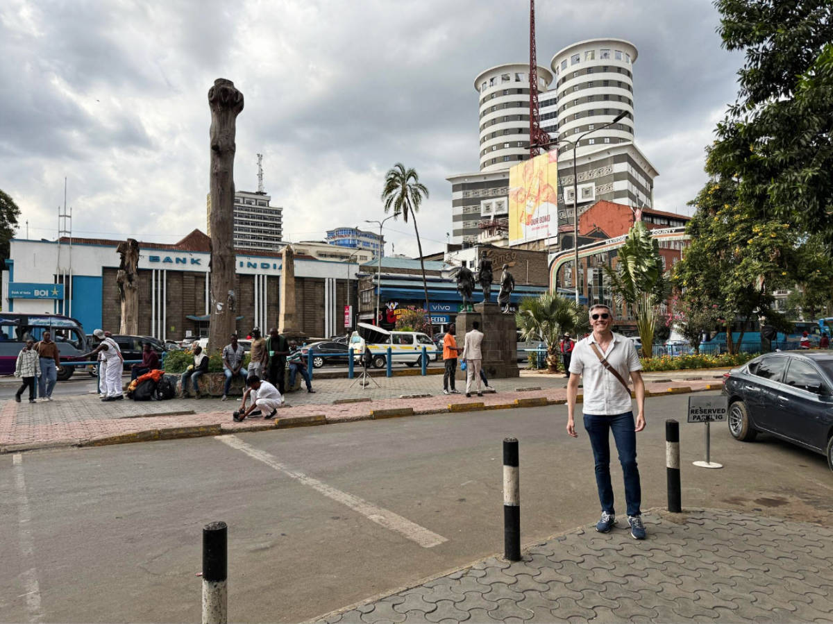 The author Nate Hake walking the streets of Nairobi's Central Business District