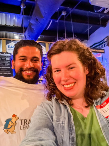 People smiling for a photo during the Travel Lemming's Nashville Community Meetups