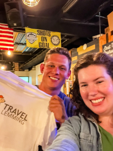 People smiling for a photo during the Travel Lemming's Nashville Community Meetups