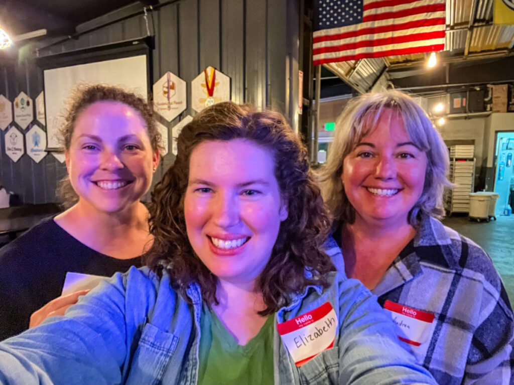 People smiling for a photo during the Travel Lemming's Nashville Community Meetups