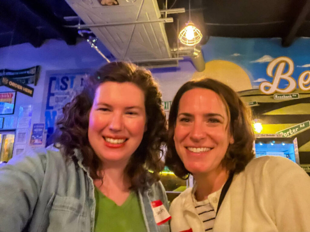 People smiling for a photo during the Travel Lemming's Nashville Community Meetups