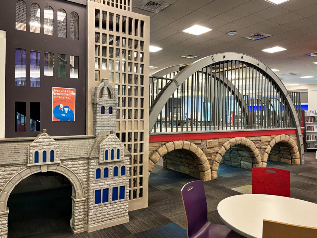The castle and bridge like play area inside the Nashville Public Library