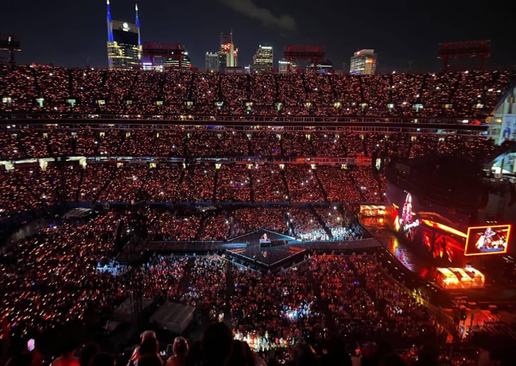View of people at night during a concert in Nashville’s Nissan Stadium