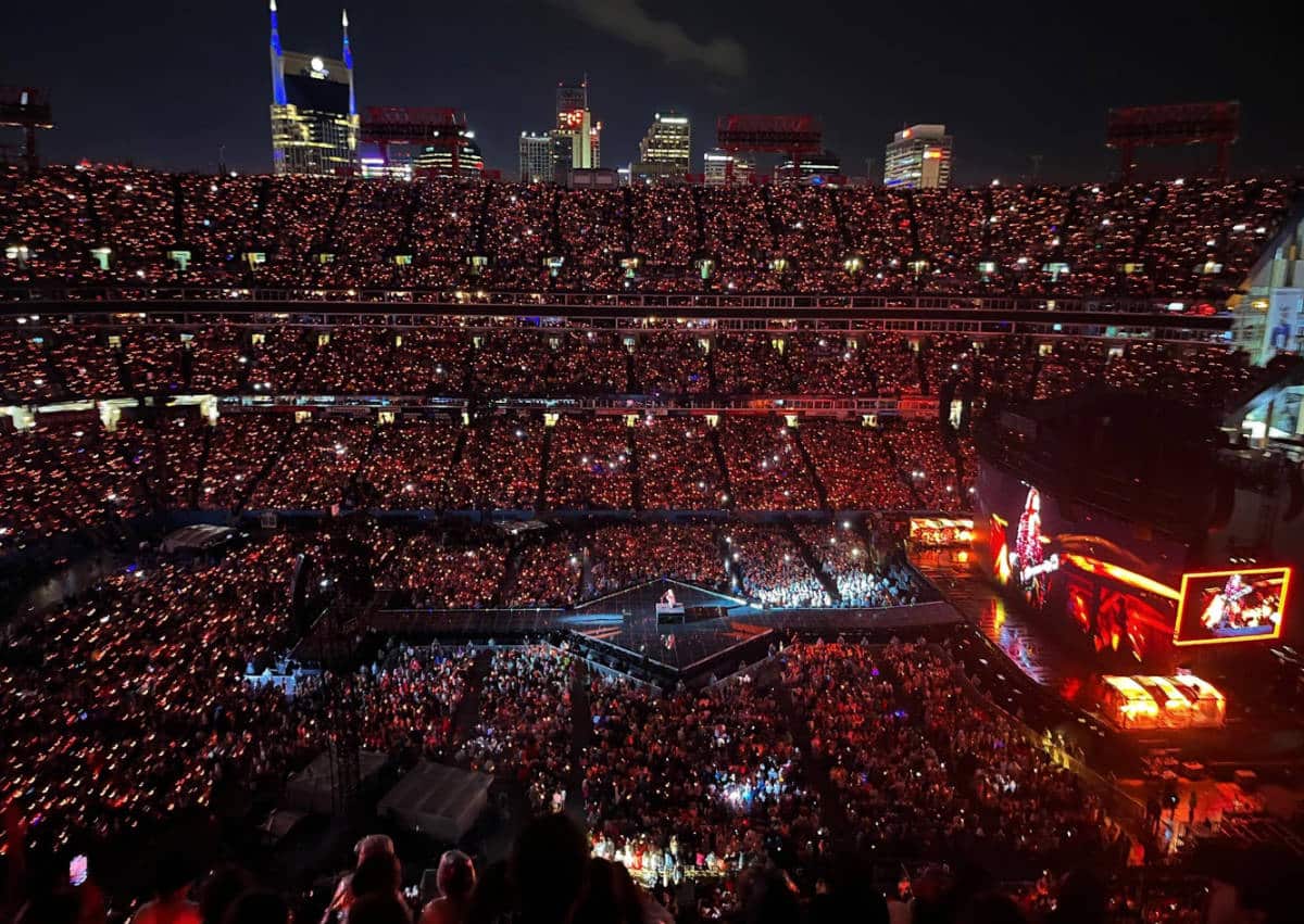 View of people at night during a concert in Nashville’s Nissan Stadium