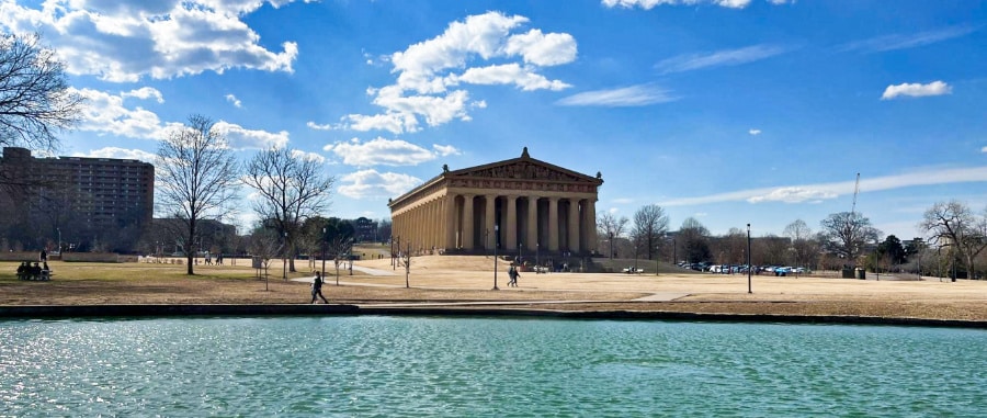 Panoramic view of Nashville’s Parthenon in Centennial Park across the water