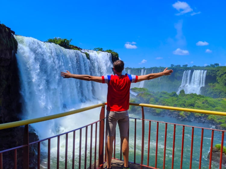 Travel Lemming founder Nate Hake, admiring the overlooking view of Iguazu Falls