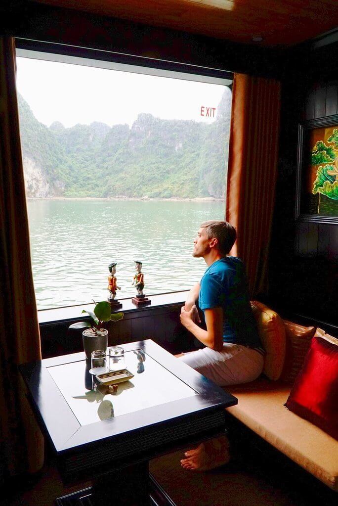 Travel Lemming founder Nate Hake, looking out the window of the Dragon Legend 2 cruise