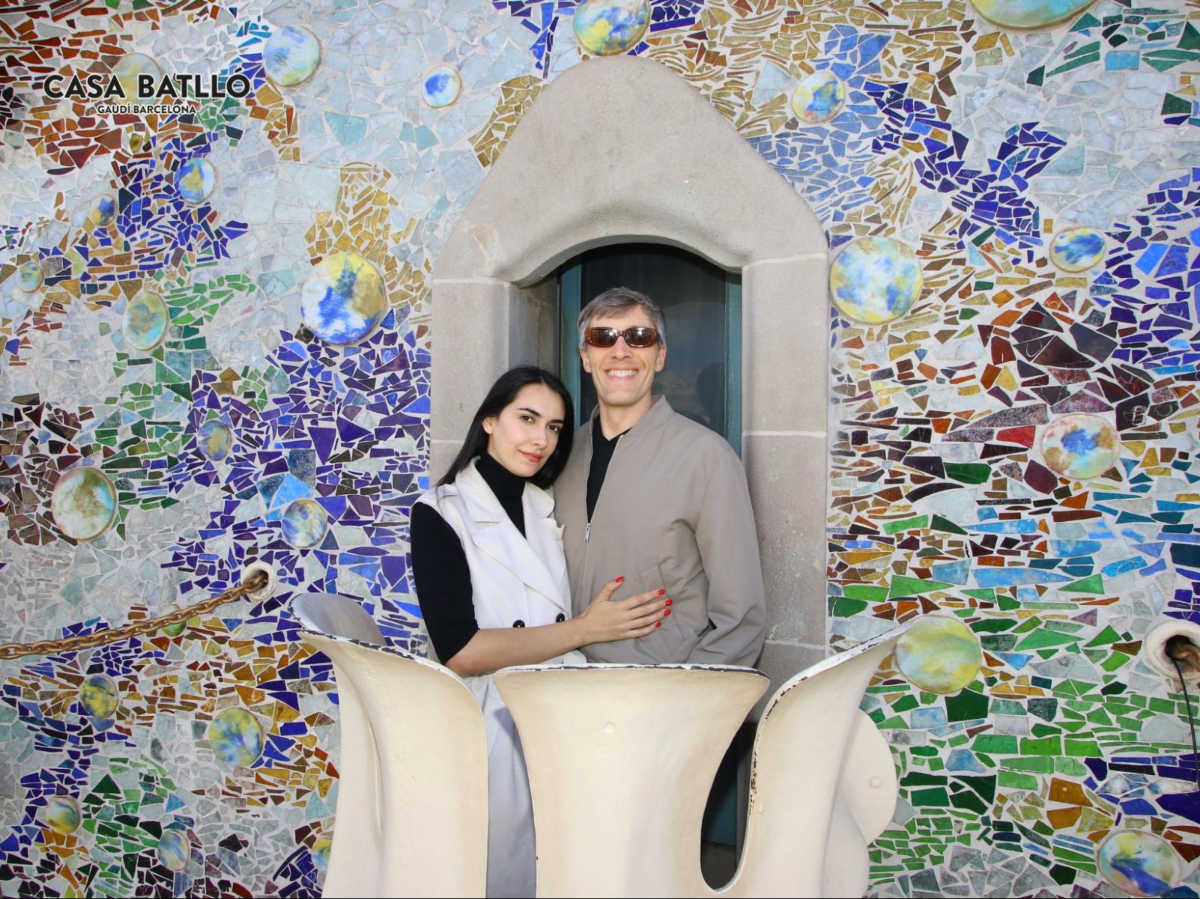 Travel Lemming Founder Nate Hake and his partner Clara, posing for a photo at the intricate interior of Casa Batllo
