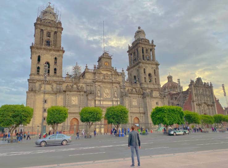 The author standing in front of the Mexico City Metropolitan Cathedral in Mexico City