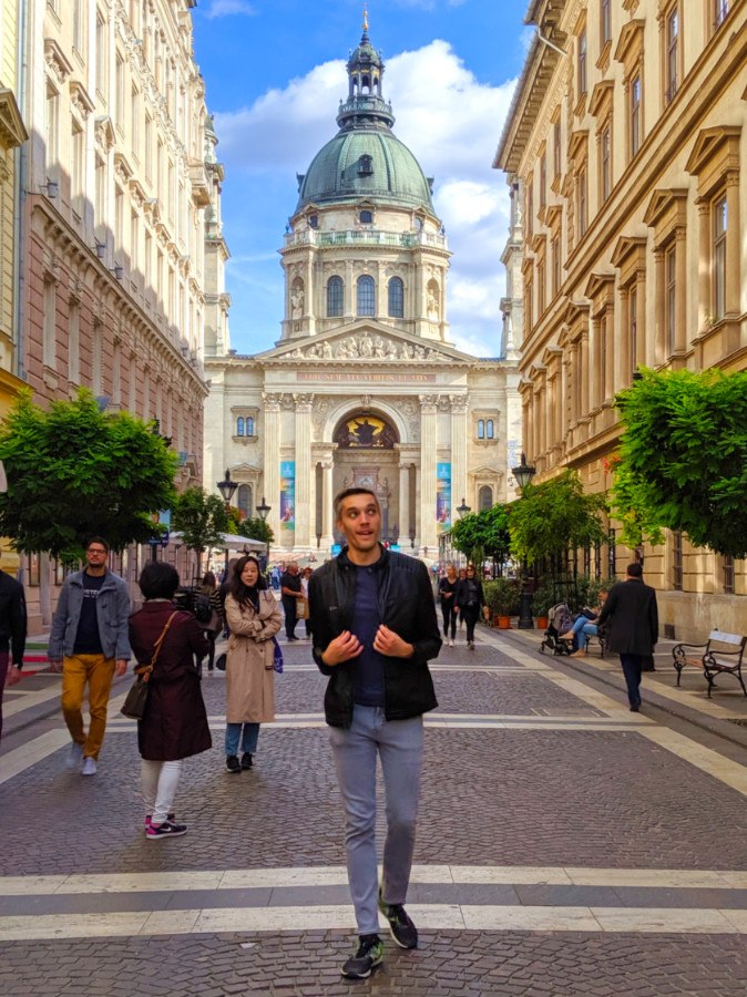 The author Nate Hake walking in front of St Stephens Basilica