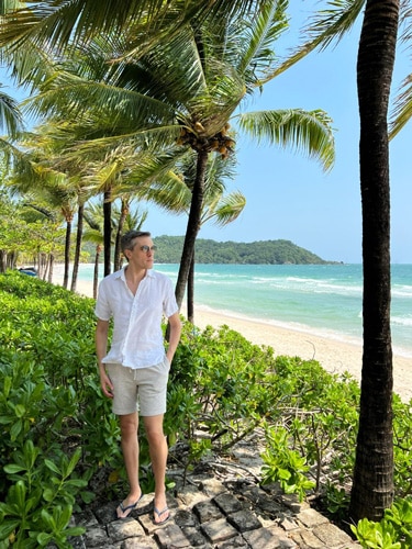 Nate posing for a photo at the Khem Beach